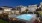 a swimming pool surrounded by houses