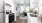 a kitchen with white cabinets
